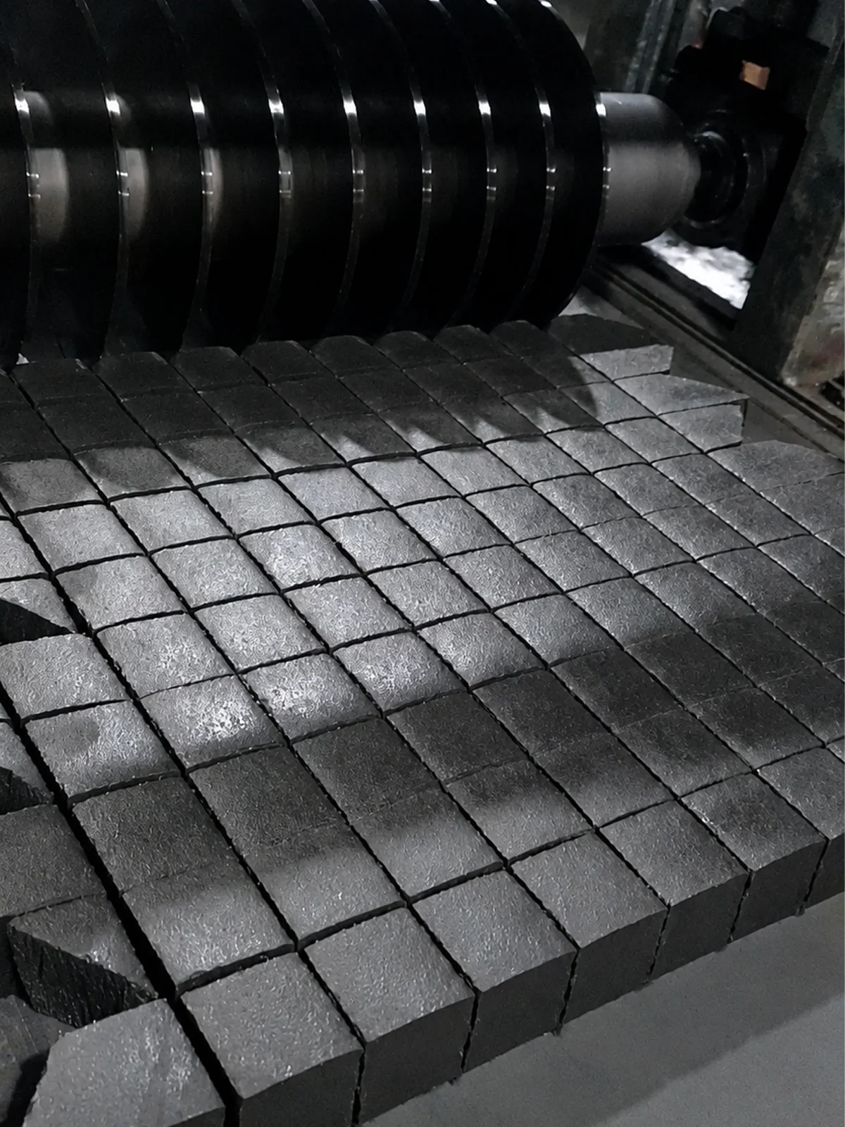 Cutting process of coconut charcoal briquettes in factory